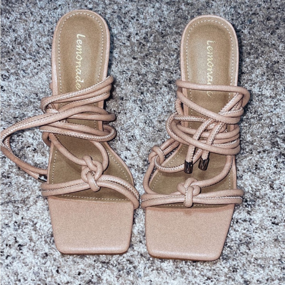 Nude strap up heels